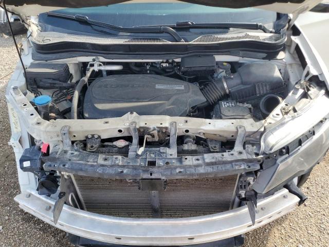 Photo 12 from auction – 2017 HONDA PILOT TOURING with VIN 5FNYF6H94HB095974