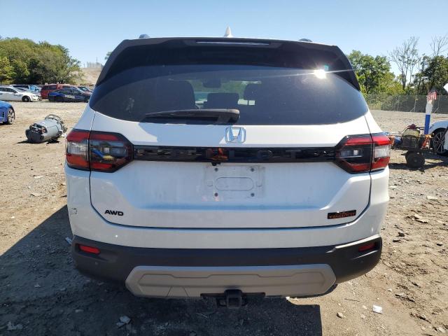 Photo 6 from auction – 2023 HONDA PILOT TRAI with VIN 5FNYG1H68PB048872