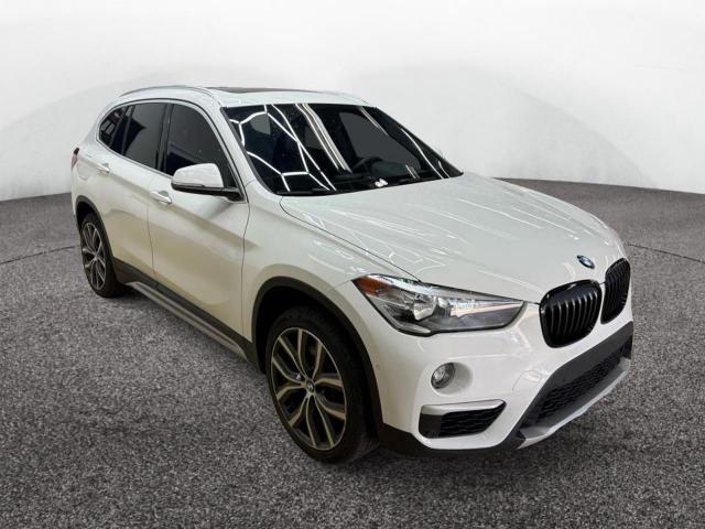 BMW X1 XDRIVE2 2018 with VIN WBXHT3C35J5L28006 - Photo from auction