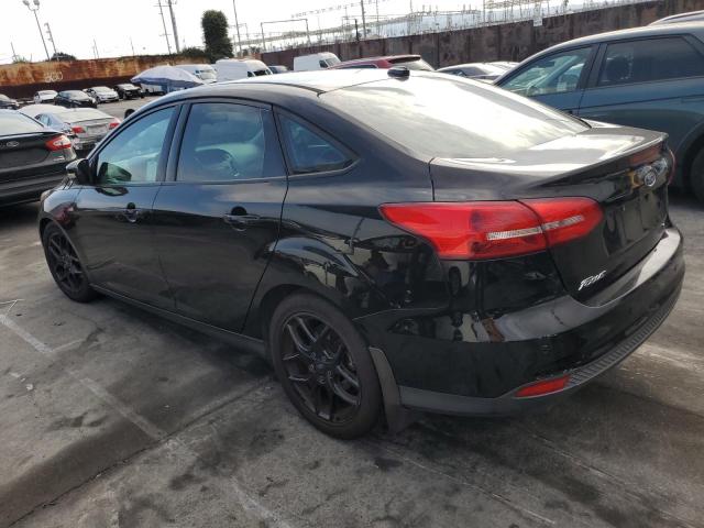 Photo 2 from auction – 2016 FORD FOCUS SE with VIN 1FADP3F24GL203284