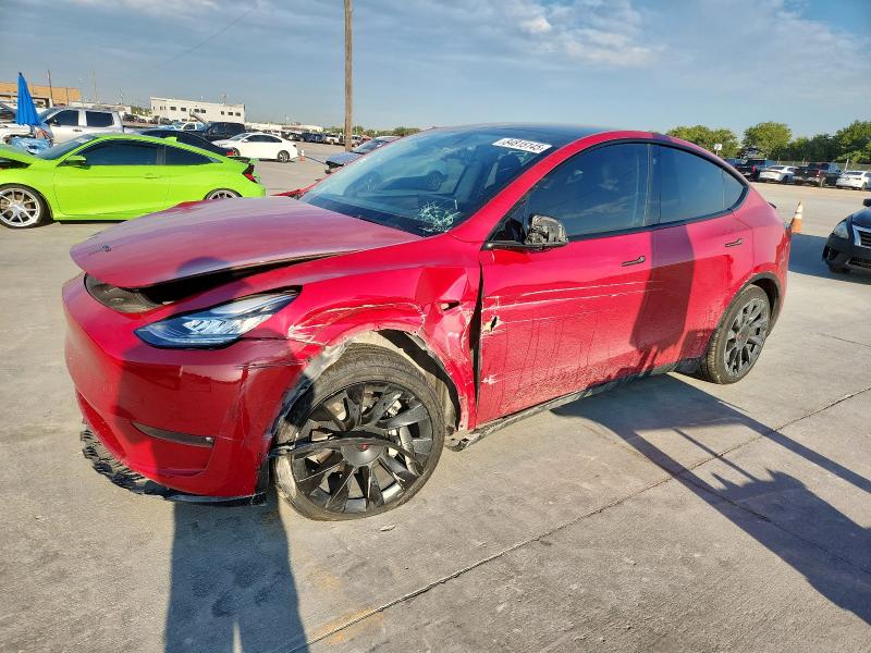 TESLA MODEL Y 2022 con VIN 7SAYGAEE8NF390561 - Foto de la subasta