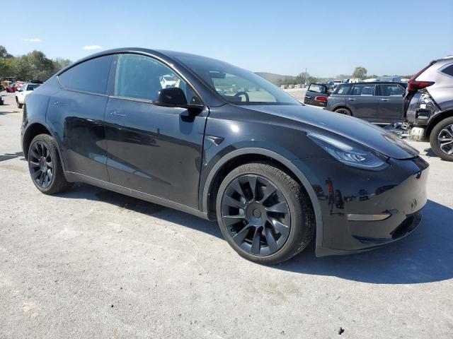 Photo 4 from auction – 2023 TESLA MODEL Y with VIN 7SAYGDEE0PA052475