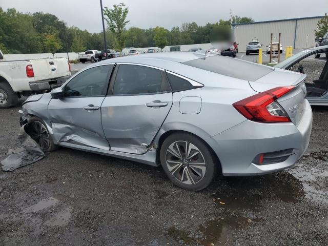 Photo 2 from auction – 2017 HONDA CIVIC EX with VIN 2HGFC1F32HH656105