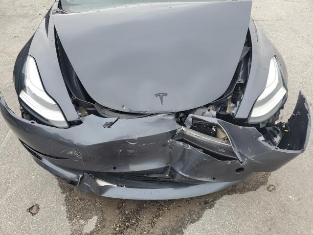 Photo 11 from auction – 2019 TESLA MODEL 3 with VIN 5YJ3E1EA8KF298517