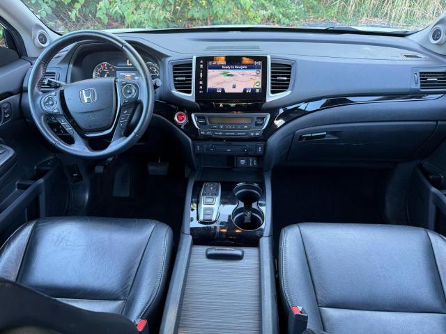 Photo 9 from auction – 2017 HONDA PILOT TOUR with VIN 5FNYF6H92HB005673