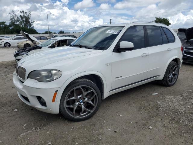 BMW X5 XDRIVE5 2012 with VIN 5UXZV8C53CL423817 - Photo from auction