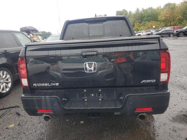 Photo 6 from auction – 2022 HONDA RIDGELINE with VIN 5FPYK3F75NB032283