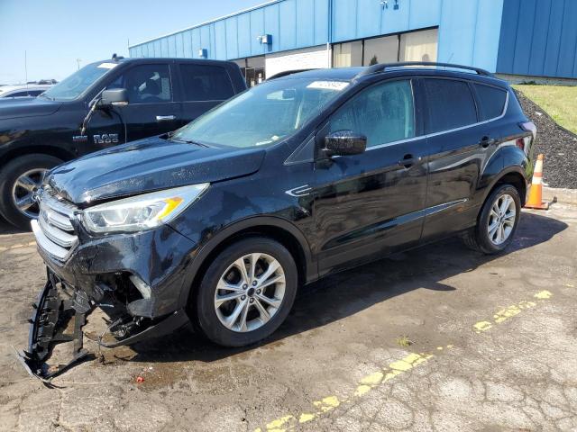 FORD ESCAPE SE 2017 with VIN 1FMCU0GD9HUC64103 - Photo from auction