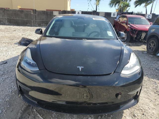 Photo 5 from auction – 2021 TESLA MODEL 3 with VIN 5YJ3E1EA8MF860015