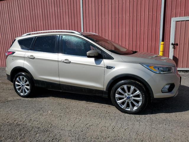 Photo 4 from auction – 2017 FORD ESCAPE TITANIUM with VIN 1FMCU9J91HUB18657