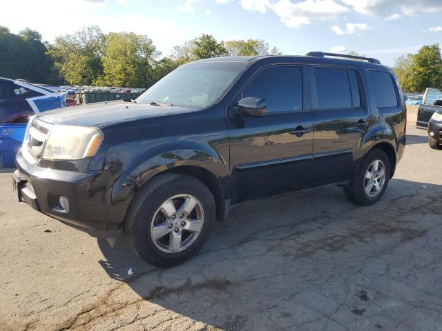 HONDA PILOT EXL 2011 with VIN 5FNYF4H61BB043333 - Photo from auction