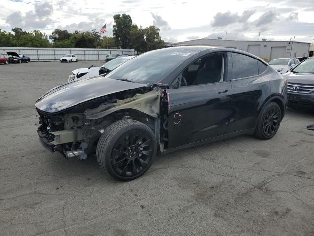 TESLA MODEL Y 2023 with VIN 7SAYGAEE9PF715124 - Photo from auction