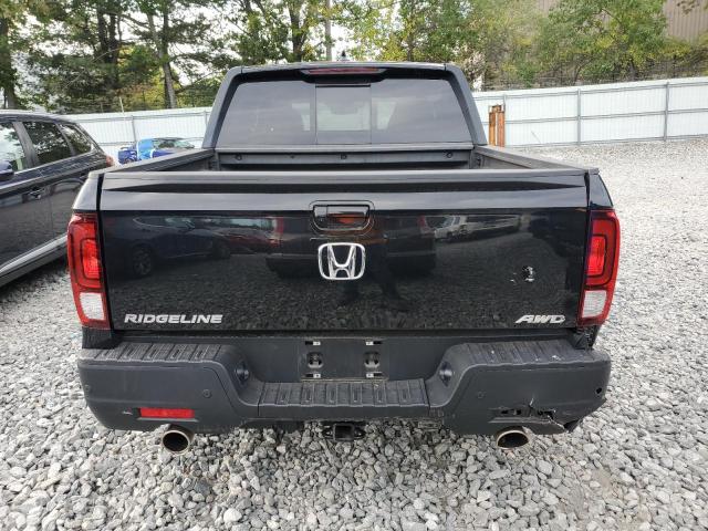 Photo 6 from auction – 2023 HONDA RIDGELINE with VIN 5FPYK3F83PB058697