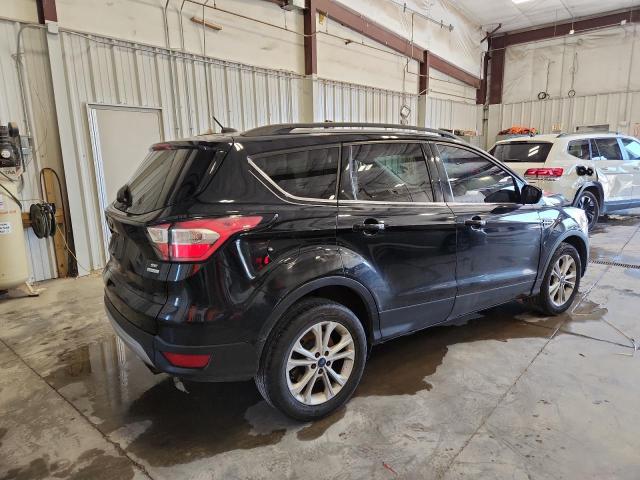 Foto 3 de la subasta – 2017 FORD ESCAPE SE con VIN 1FMCU0GD2HUD09446