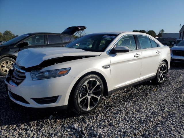 FORD TAURUS SEL 2014 with VIN 1FAHP2E87EG117314 - Photo from auction