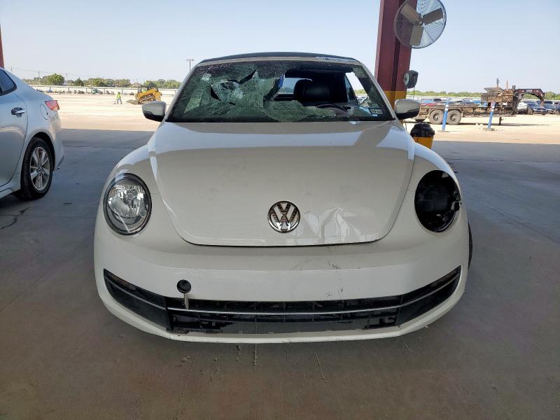 Photo 5 from auction – 2013 VOLKSWAGEN BEETLE with VIN 3VW5L7AT3DM829532