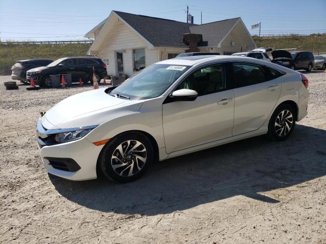 HONDA CIVIC EX 2018 with VIN 19XFC2F78JE031300 - Photo from auction