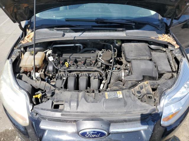 Photo 11 from auction – 2014 FORD FOCUS S with VIN 1FADP3E28EL418584