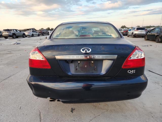 Photo 6 from auction – 2002 INFINITI Q45 with VIN JNKBF01A32M006996