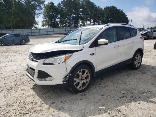 FORD ESCAPE TIT 2016 with VIN 1FMCU0J96GUC04959 - Photo from auction