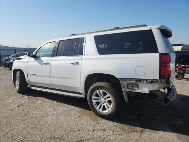 Photo 2 from auction – 2016 CHEVROLET SUBURBAN K with VIN 1GNSKHKC4GR374875