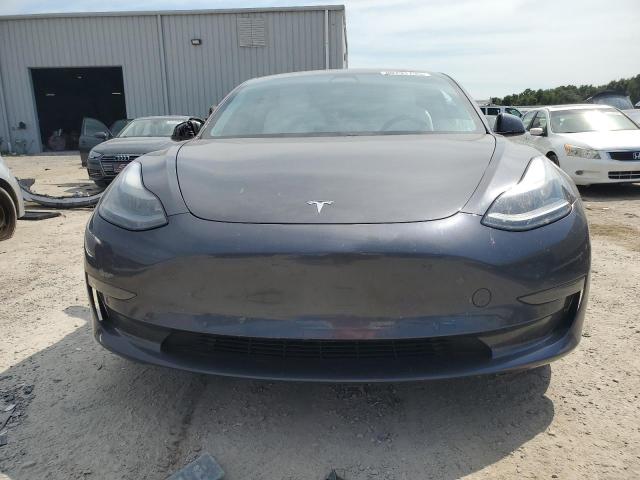 Photo 5 from auction – 2021 TESLA MODEL 3 with VIN 5YJ3E1EA5MF987272