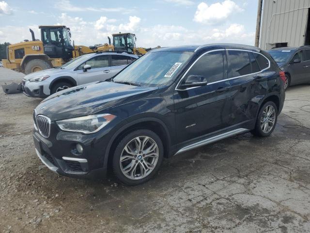 BMW X1 XDRIVE2 2017 with VIN WBXHT3Z33H4A57022 - Photo from auction