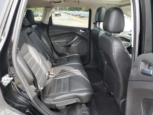 Photo 10 from auction – 2017 FORD ESCAPE TITANIUM with VIN 1FMCU9J94HUC70187