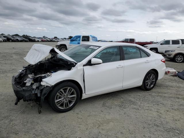 TOYOTA CAMRY LE 2016 with VIN 4T1BF1FK4GU589882 - Photo from auction