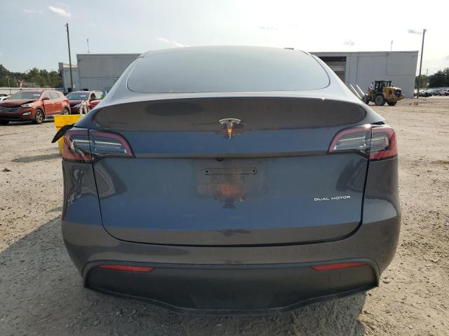 Photo 6 from auction – 2023 TESLA MODEL Y with VIN 7SAYGAEE0PF854204
