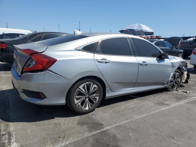 Photo 3 from auction – 2017 HONDA CIVIC EX with VIN 2HGFC1F35HH659113