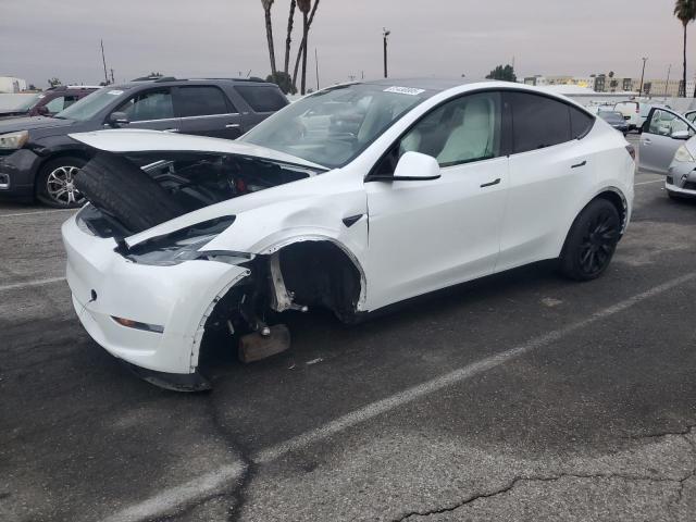 TESLA MODEL Y 2023 with VIN 7SAYGDEE4PF624392 - Photo from auction