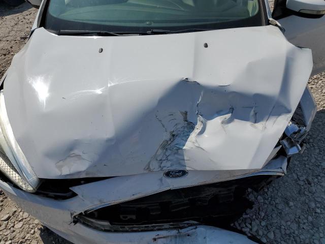 Photo 11 from auction – 2015 FORD FOCUS SE with VIN 1FADP3F24FL250572