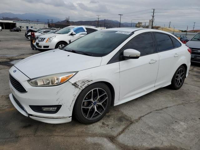 FORD FOCUS SE 2016 with VIN 1FADP3F27GL372618 - Photo from auction