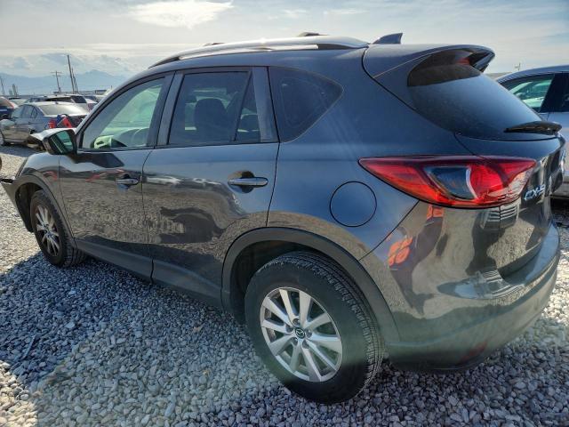 Photo 2 from auction – 2014 MAZDA CX-5 SPORT with VIN JM3KE2BE4E0414573