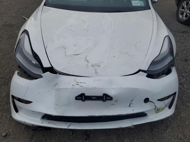Photo 11 from auction – 2022 TESLA MODEL 3 with VIN 5YJ3E1EC0NF109008