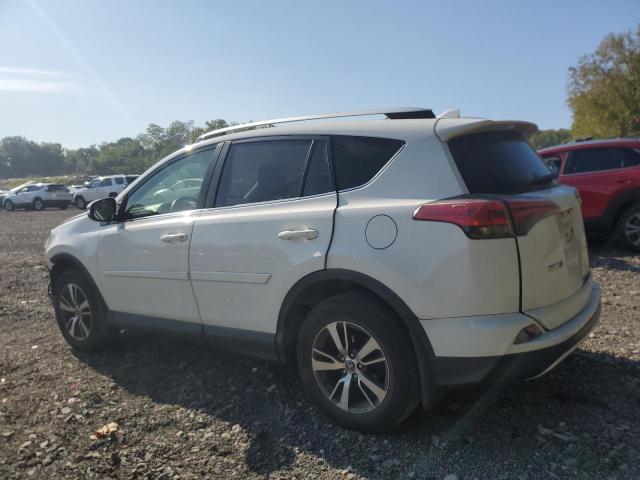 Photo 2 from auction – 2016 TOYOTA RAV4 XLE with VIN JTMRFREV8GJ057629
