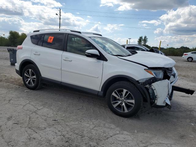Photo 4 from auction – 2016 TOYOTA RAV4 XLE with VIN JTMWFREV1GD085287
