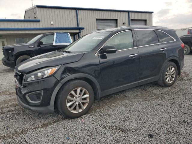 KIA SORENTO LX 2016 with VIN 5XYPG4A32GG021639 - Photo from auction