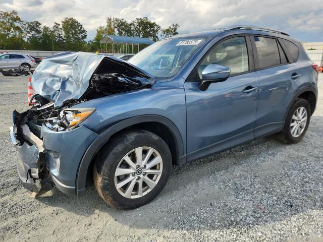 MAZDA CX-5 TOURING 2016 with VIN JM3KE2CY7G0600619 - Photo from auction