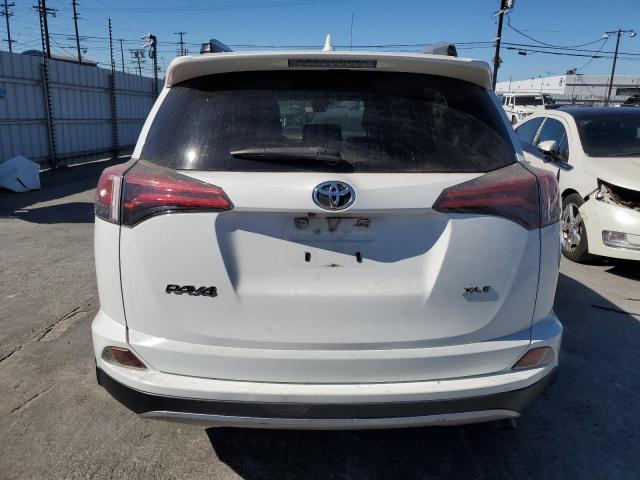 Photo 6 from auction – 2017 TOYOTA RAV4 XLE with VIN JTMWFREV0HJ127628