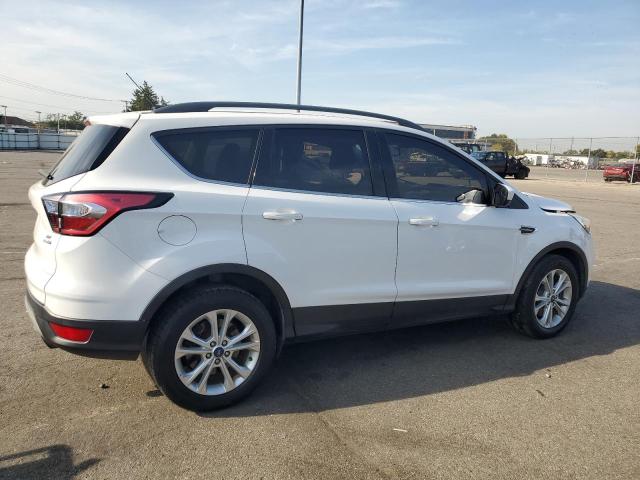 Photo 3 from auction – 2018 FORD ESCAPE SE with VIN 1FMCU9GD5JUC11098