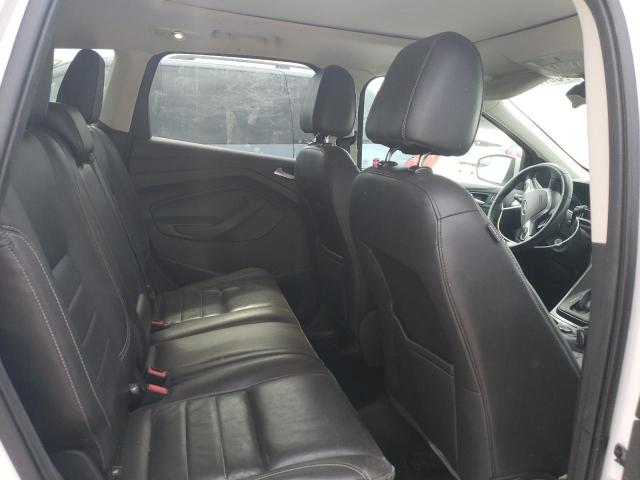 Photo 11 from auction – 2016 FORD ESCAPE SE with VIN 1FMCU9G90GUB94036