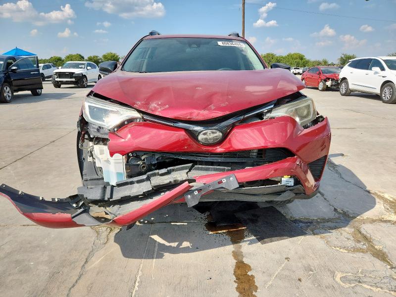 Photo 5 from auction – 2018 TOYOTA RAV4 LE with VIN 2T3ZFREV1JW451742