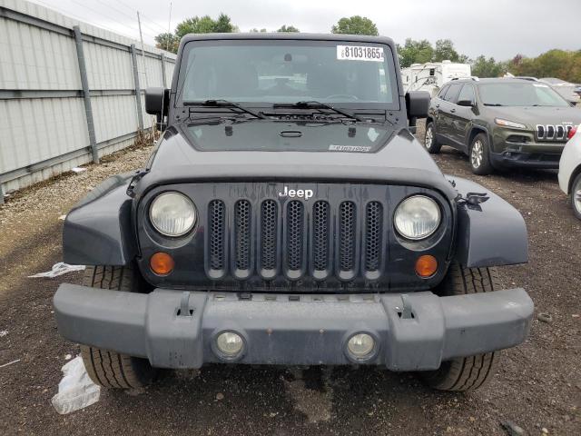 Photo 5 from auction – 2011 JEEP WRANGLER U with VIN 1J4BA5H14BL573463