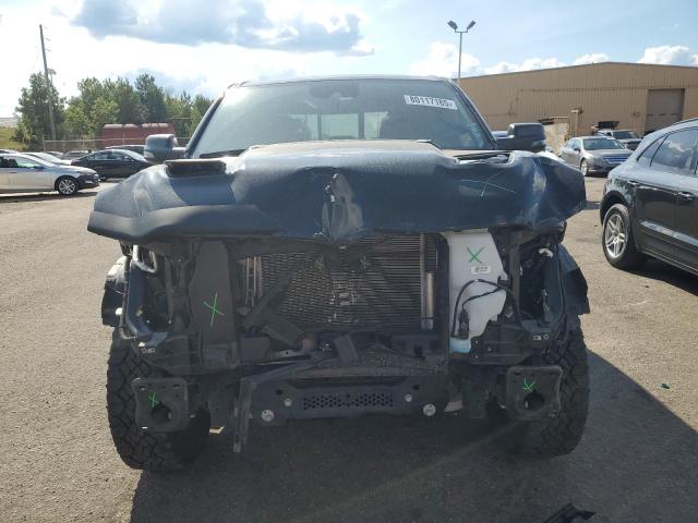 Photo 5 from auction – 2023 RAM 1500 REBEL with VIN 1C6SRFLT3PN618912