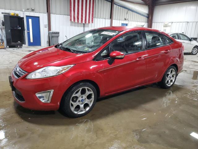 FORD FIESTA SEL 2011 with VIN 3FADP4CJXBM219093 - Photo from auction