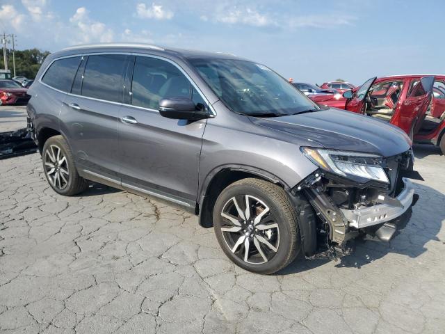 Photo 4 from auction – 2022 HONDA PILOT TOURING with VIN 5FNYF6H60NB043260