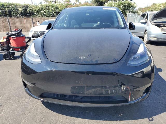 Photo 5 from auction – 2023 TESLA MODEL Y with VIN 7SAYGDEE0PF899032