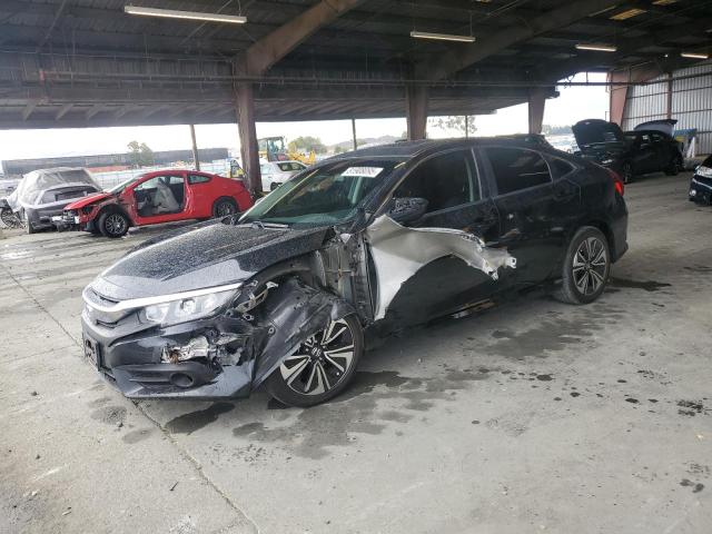 HONDA CIVIC EXL 2018 with VIN JHMFC1F79JX022050 - Photo from auction